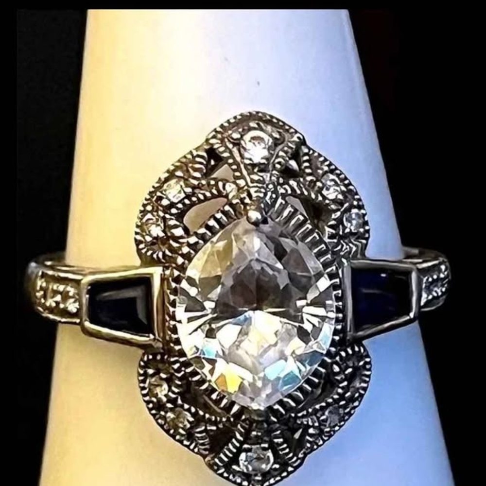 Intricate Silver and Blue Gemstone Ring
